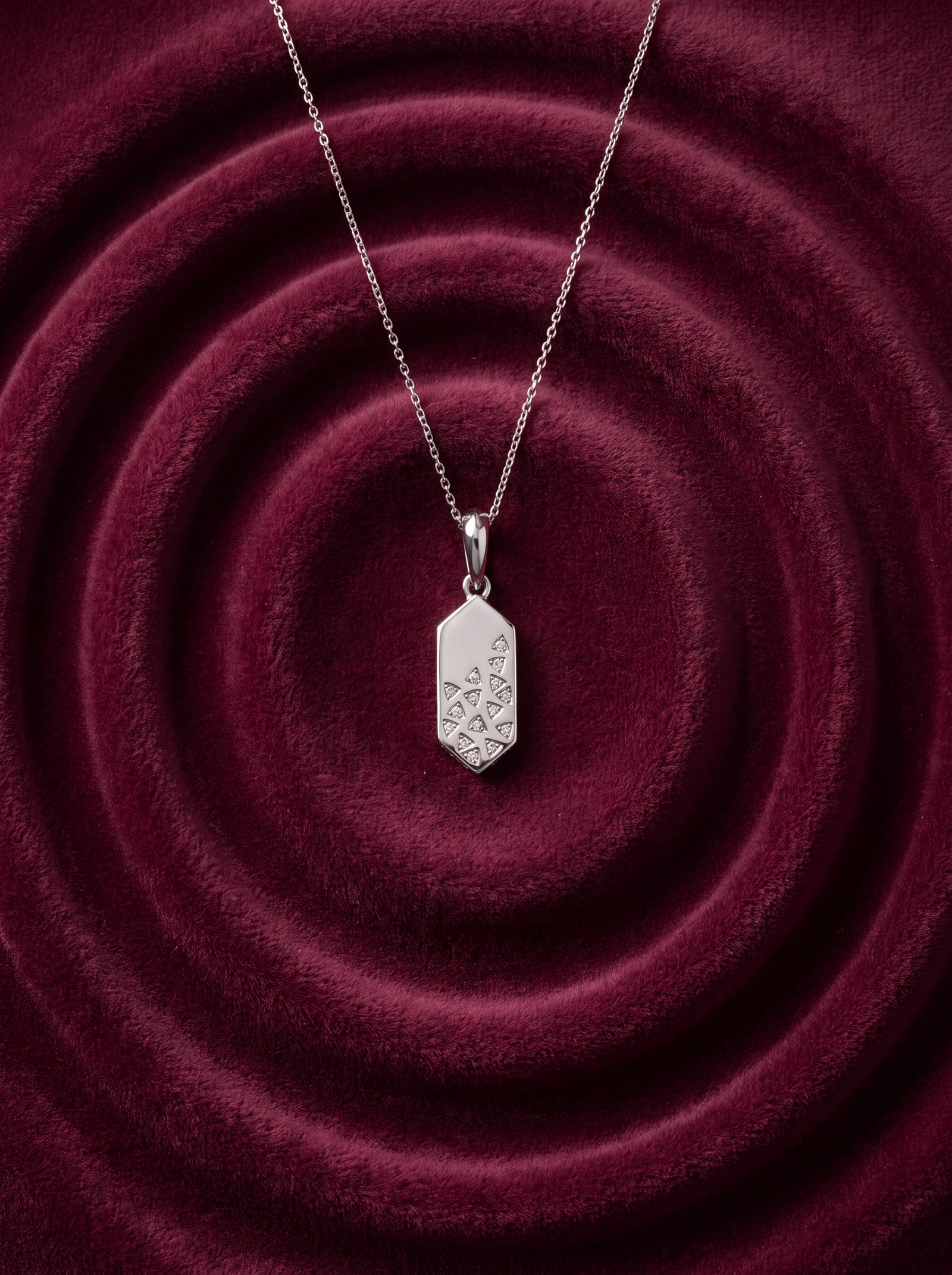 CRISTAL -CUT TAG SILVER PENDANT